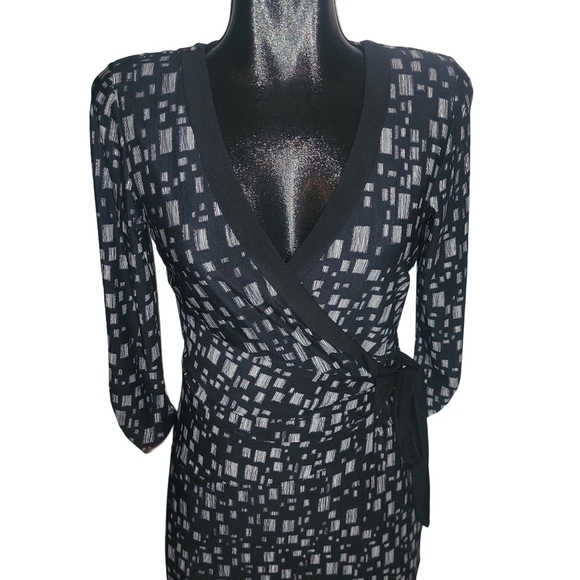 le chateau Dresses & Skirts - Le Chateau Black and White Patterned Wrap Style Dress M